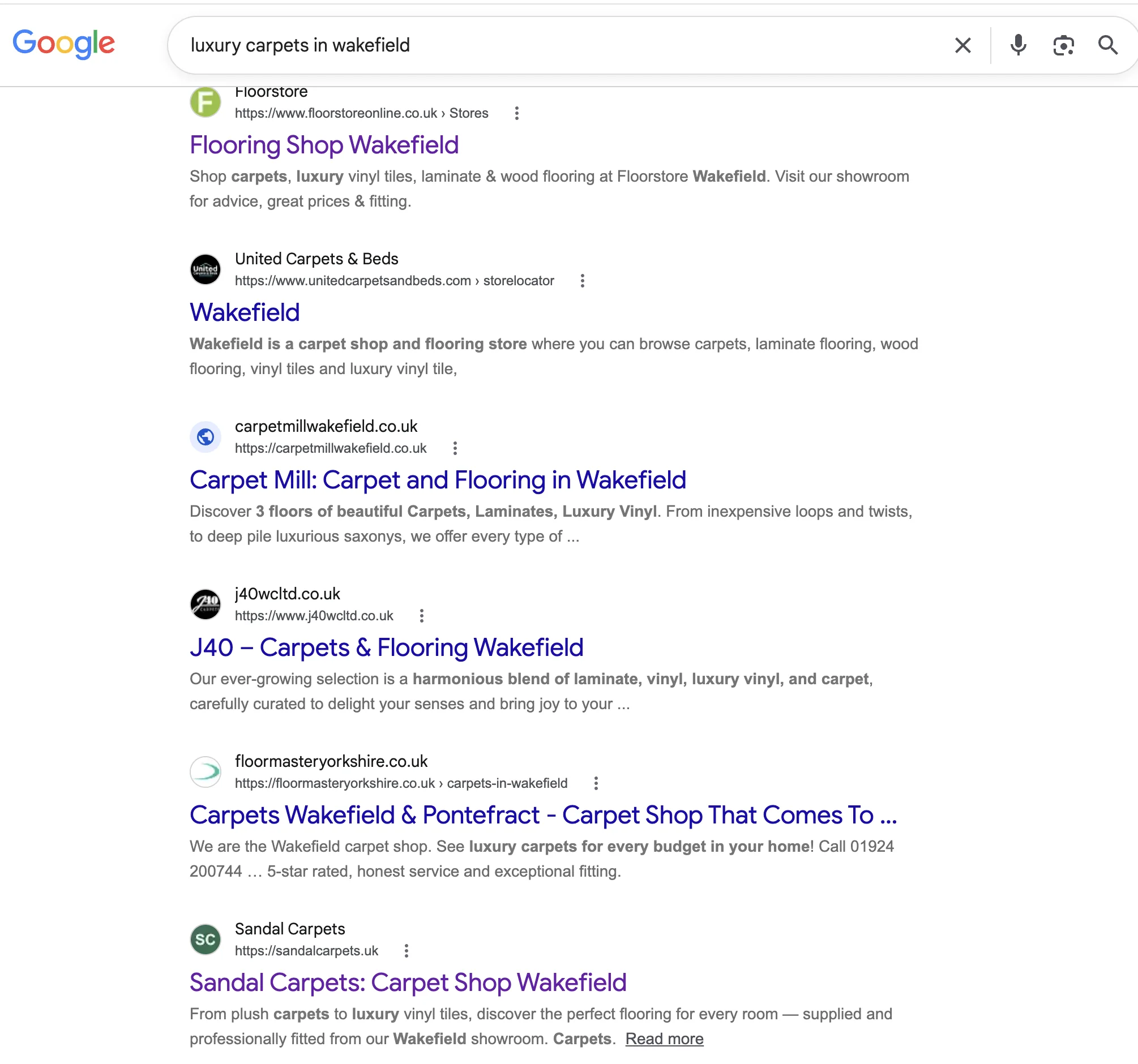 Google search results for “luxury carpets in wakefield” showing Sandal Carpets in seventh place